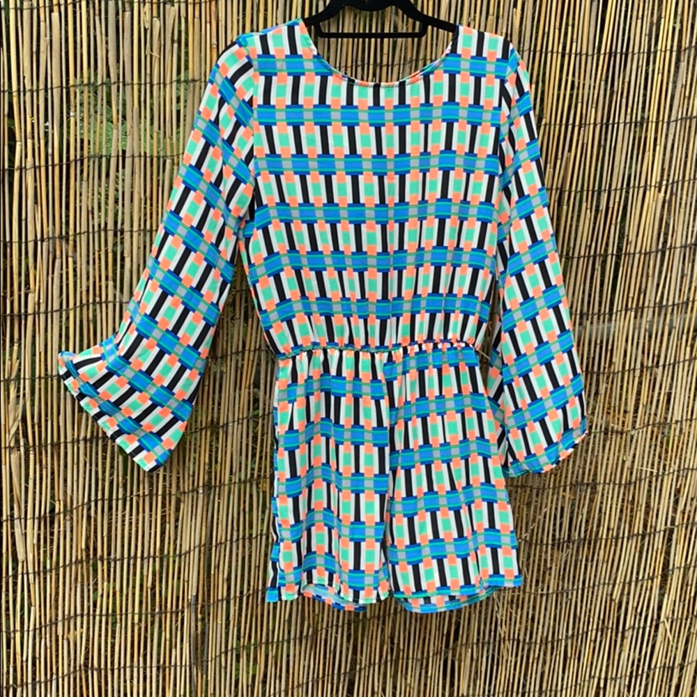 Vibrant geometric print romper